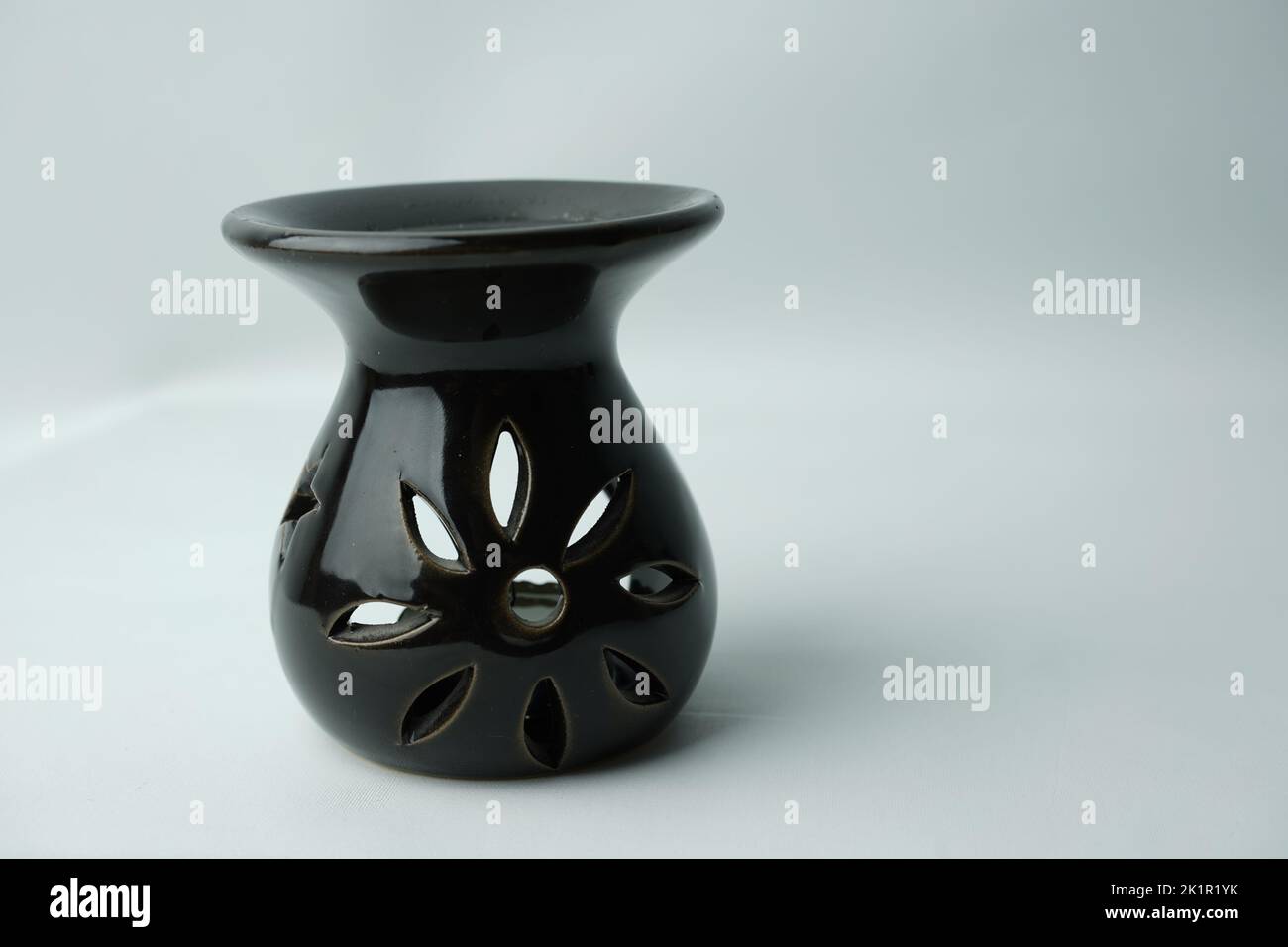 incense burner censer with smoke and white background.Ornamental Arabic
