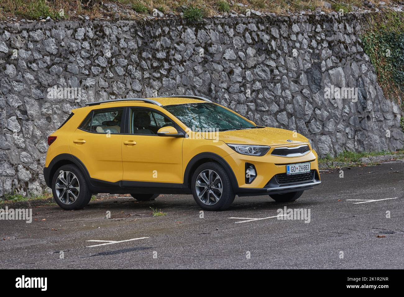 Car parked in the rain, Kia Stonic Stock Photo Alamy