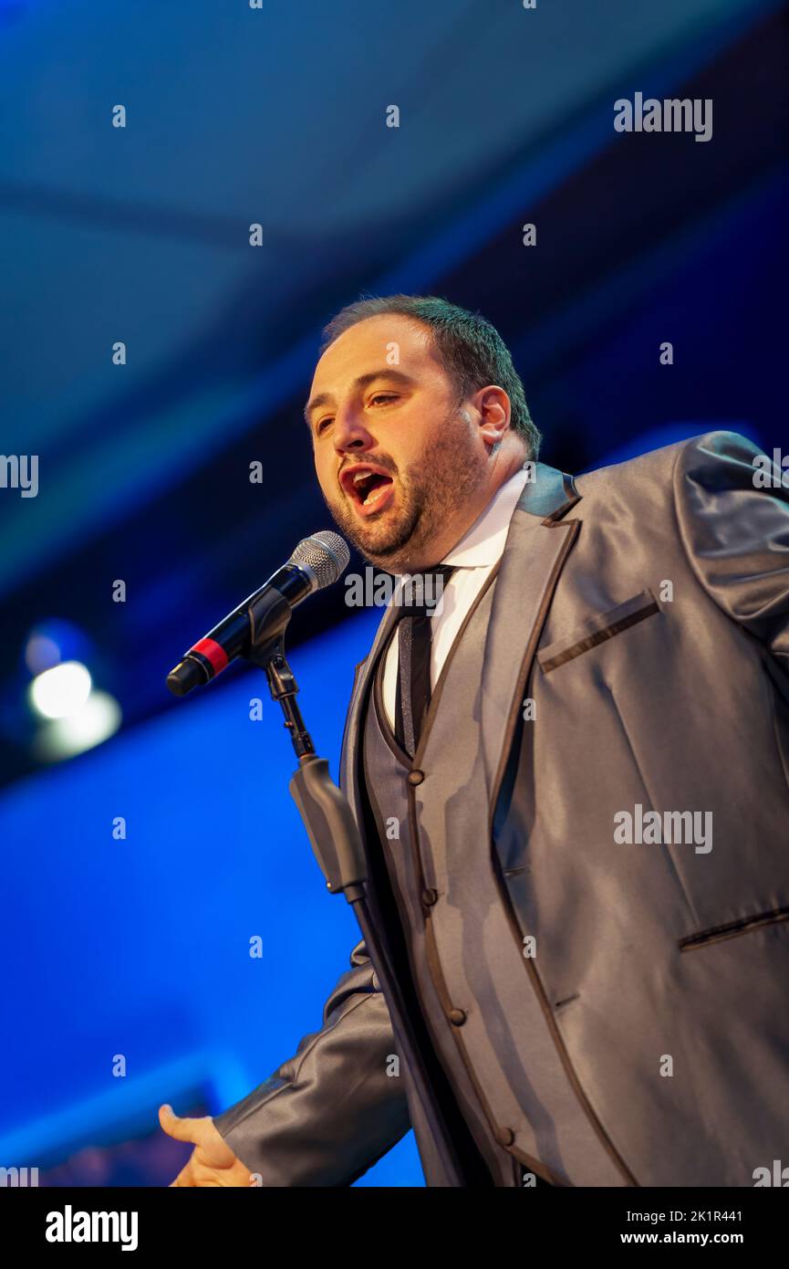 Welsh opera singer, Wynne Evans, (of Go Compare fame), performing at the Llangollen International Musical Eisteddfod, in Llangollen, North Wales, UK. Stock Photo