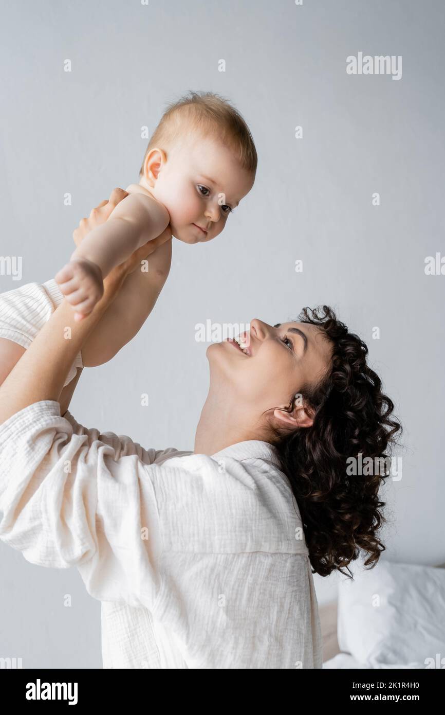 Smiling curly girl in hi-res stock photography and images - Alamy