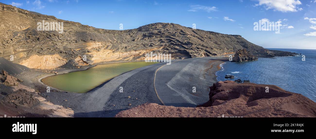 The Charco de los Clicos (Charco Verde) or Green Lake, a green inland lake near El Golfo on the island of Lanzarote, Spain. The green color is caused Stock Photo