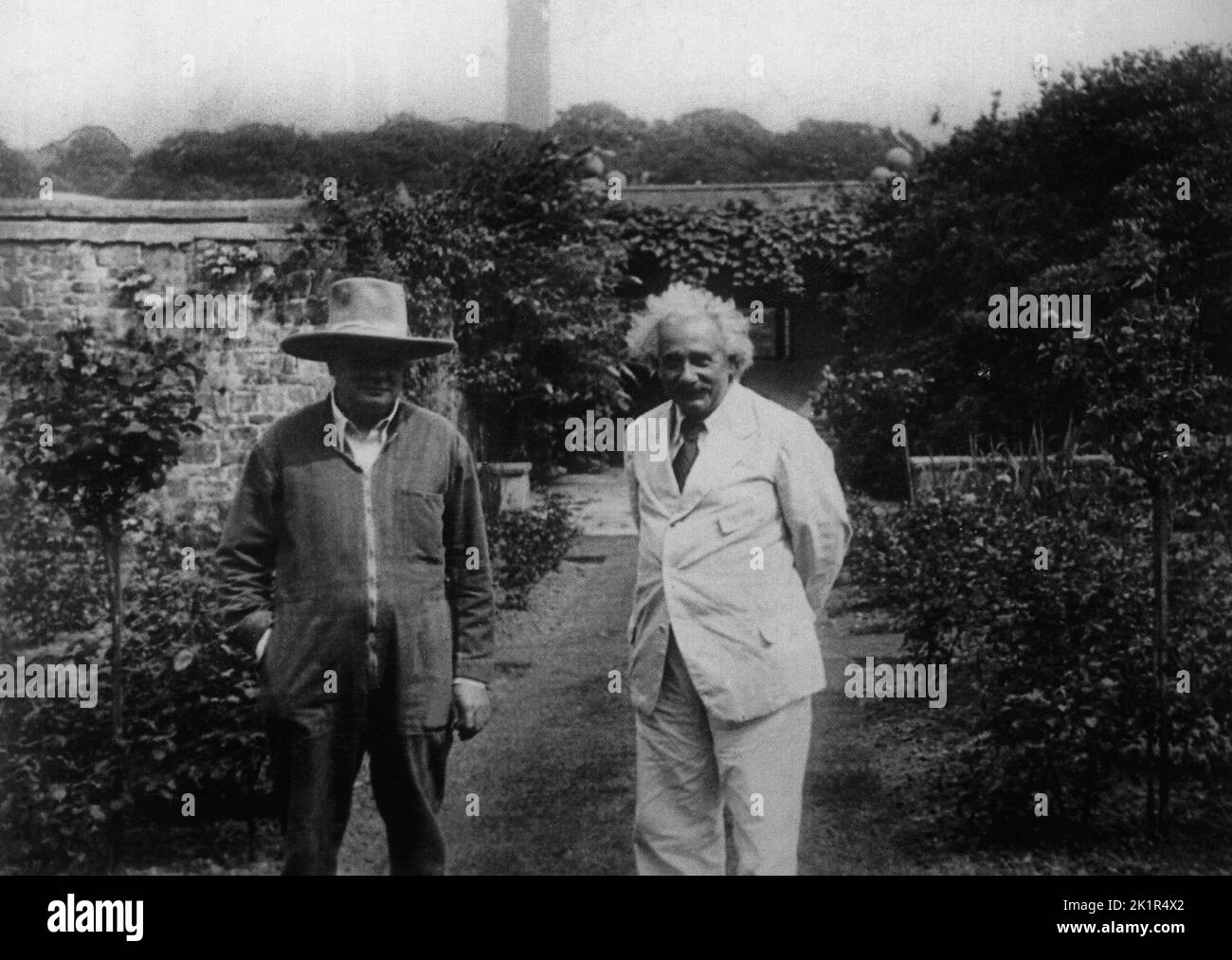 Winston Churchill with Albert Einstein in the gardens at Chartwell. 1933 Stock Photo