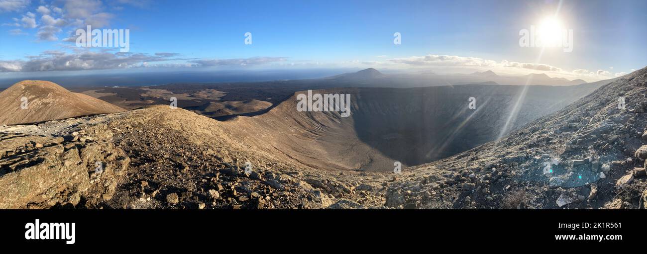 Panoramic image of the crater Caldera Blanca on early morning. Lanzarote island, Spain. Stock Photo