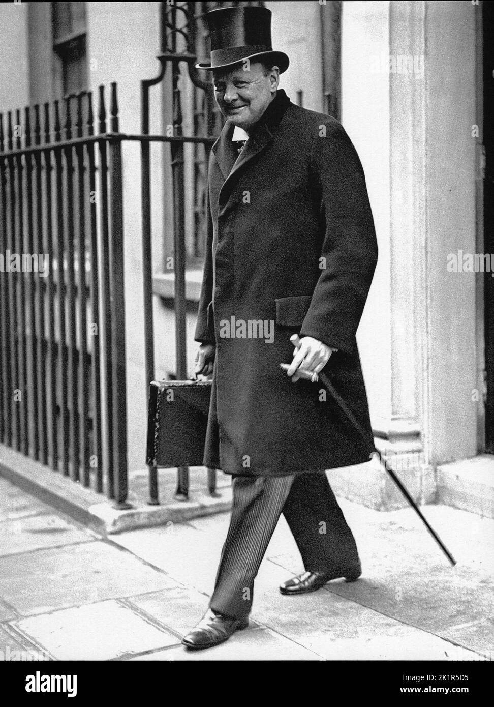 Winston Churchill as Chancellor of the Exchequer leaving Downing Street to give his budget speech. 1925 Stock Photo