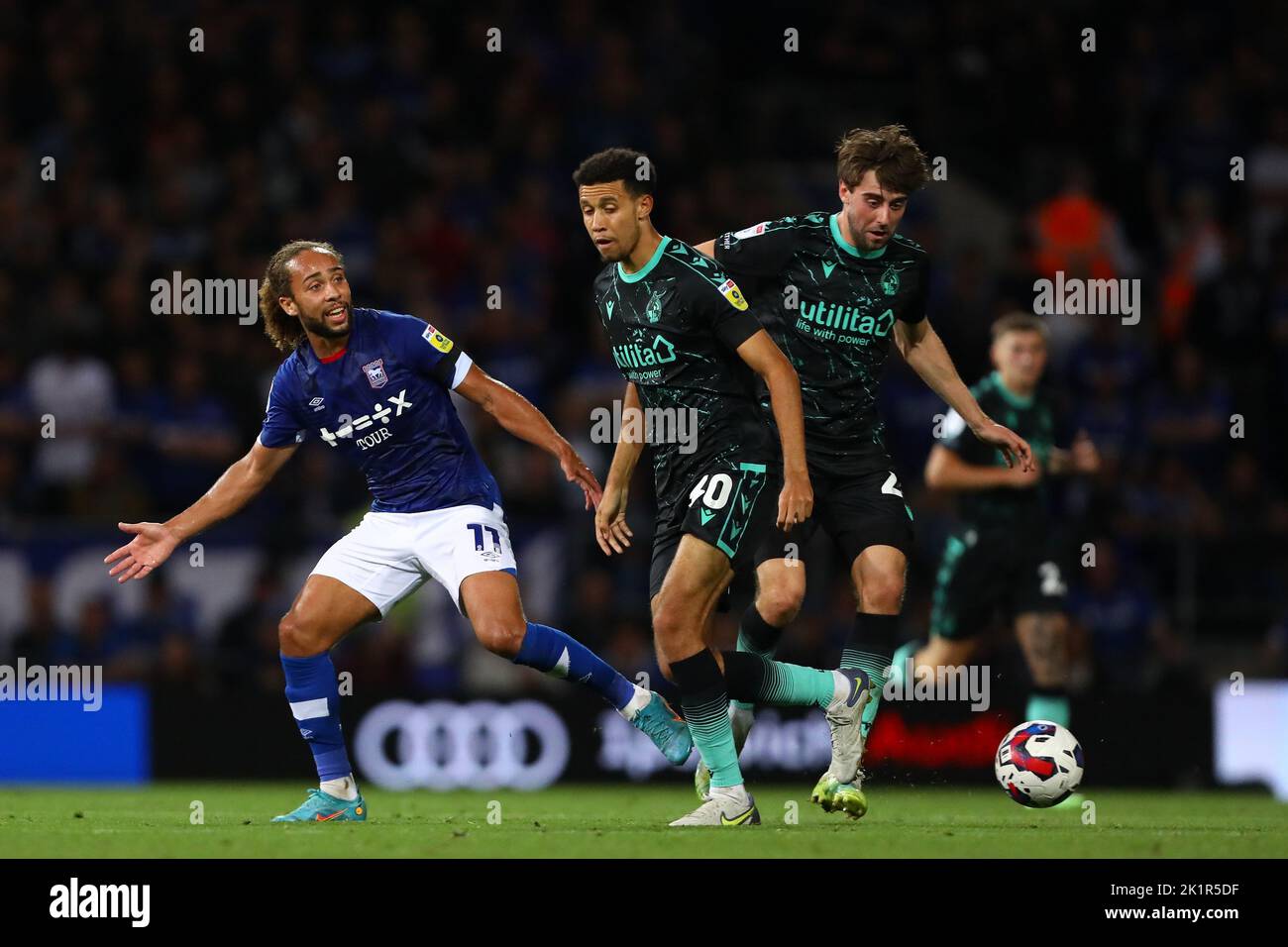 Marcus Harness of Ipswich Town in action with Luca Hoole (L) and Antony Evans (R) of Bristol Rovers - Ipswich Town v Bristol Rovers, Sky Bet League One, Portman Road, Ipswich, UK - 13th September 2022  Editorial Use Only - DataCo restrictions apply Stock Photo