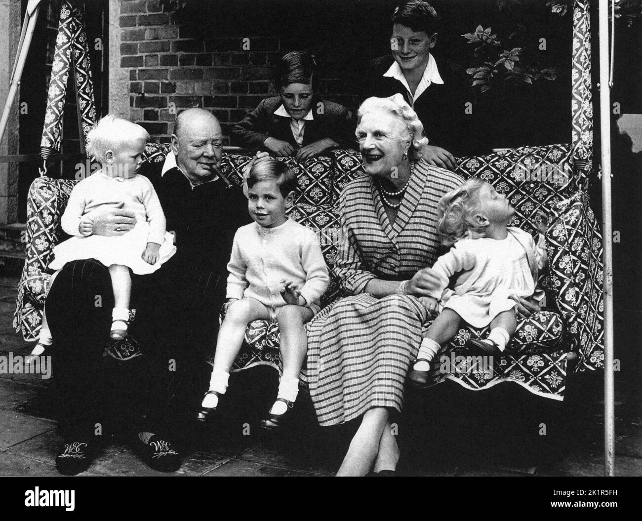 Winston Churchill with his wife, Clementine and their grandchildren ...