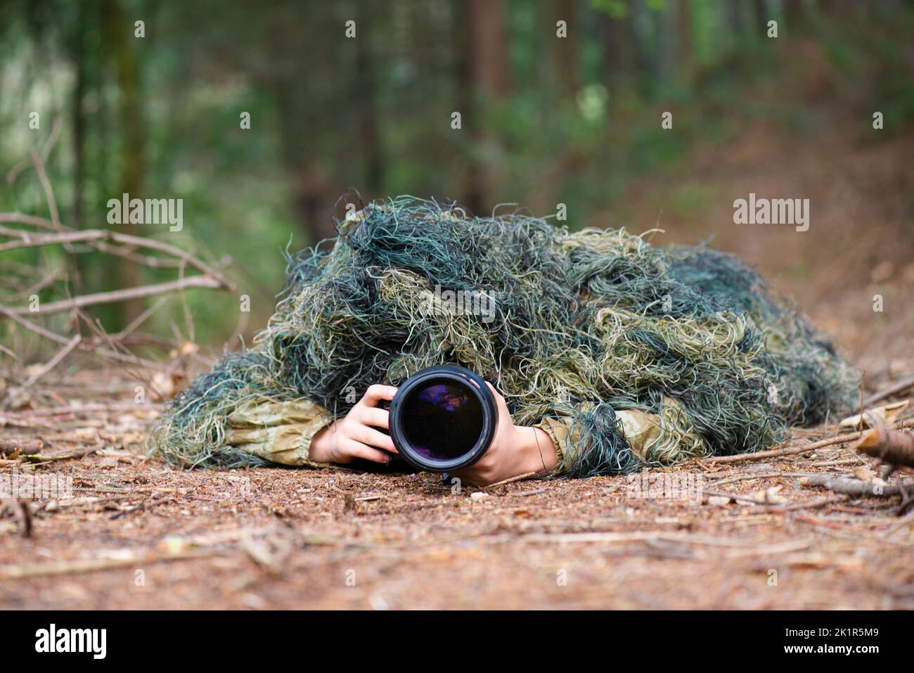 Wildlife photographer in camouflage hi-res stock photography and images ...