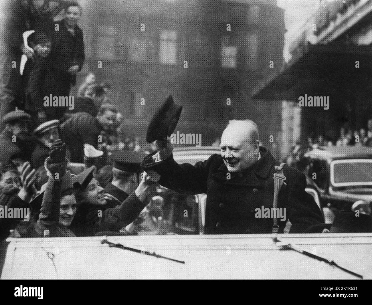 Winston Churchill visiting a bomb-damaged neighbourhood in Liverpool. 1941 Stock Photo