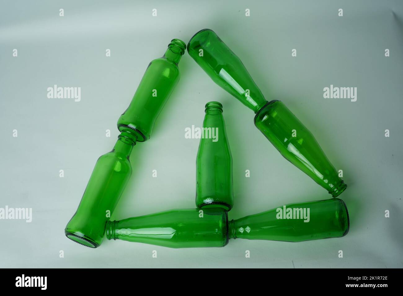 Glass bottles of soda on white background Stock Photo - Alamy