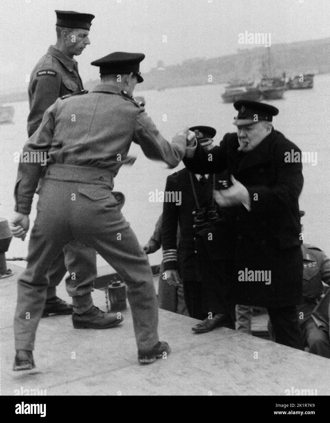 Winston Churchill disembarking on to a Mulberry harbour section at Arromanches, Normandy just after the D-Day landings, June 1944 Stock Photo