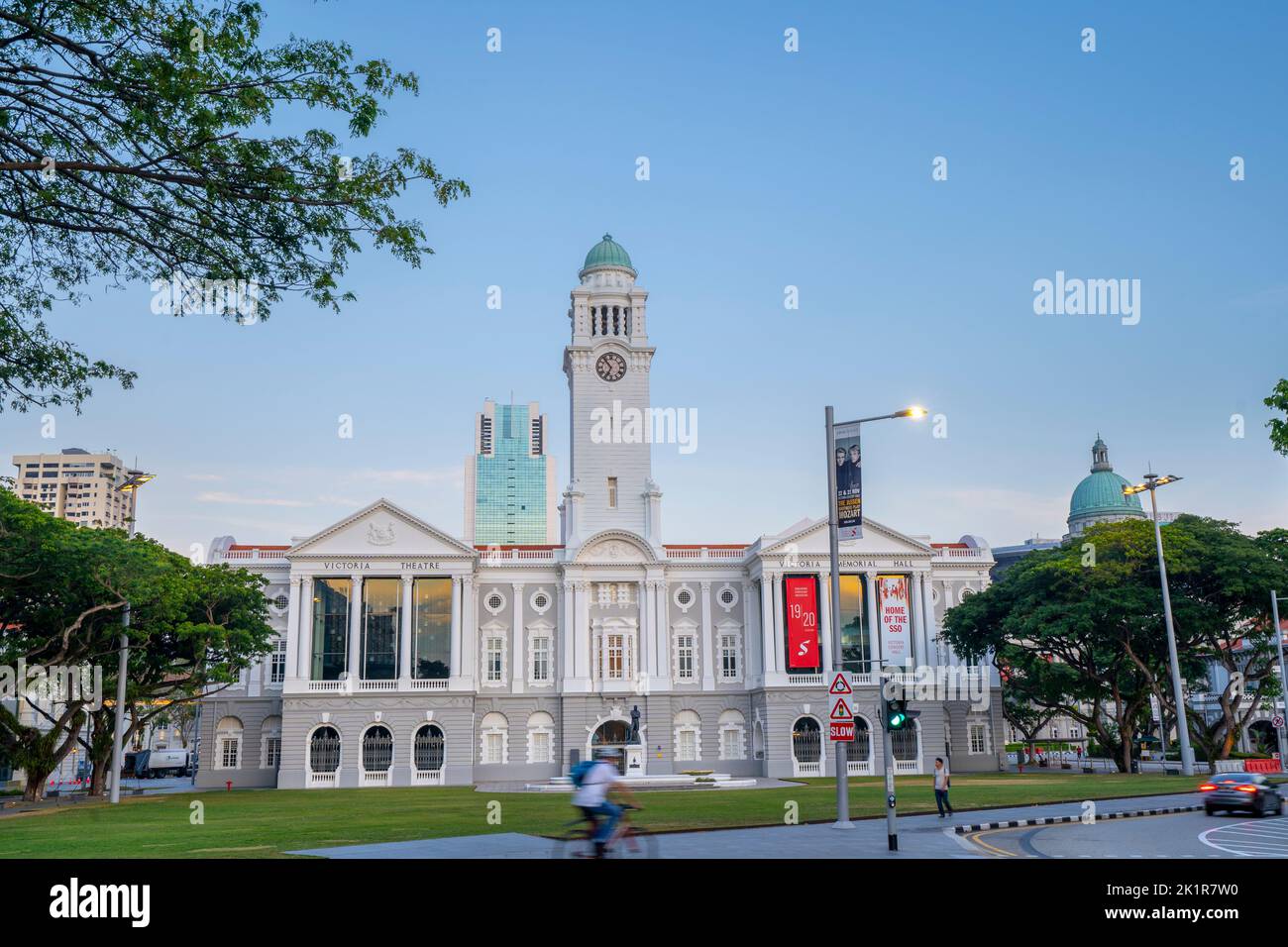 Victoria Theatre and Concert Hall surrounded by Empress Lawn on banks of Singapore River. Singapore Stock Photo