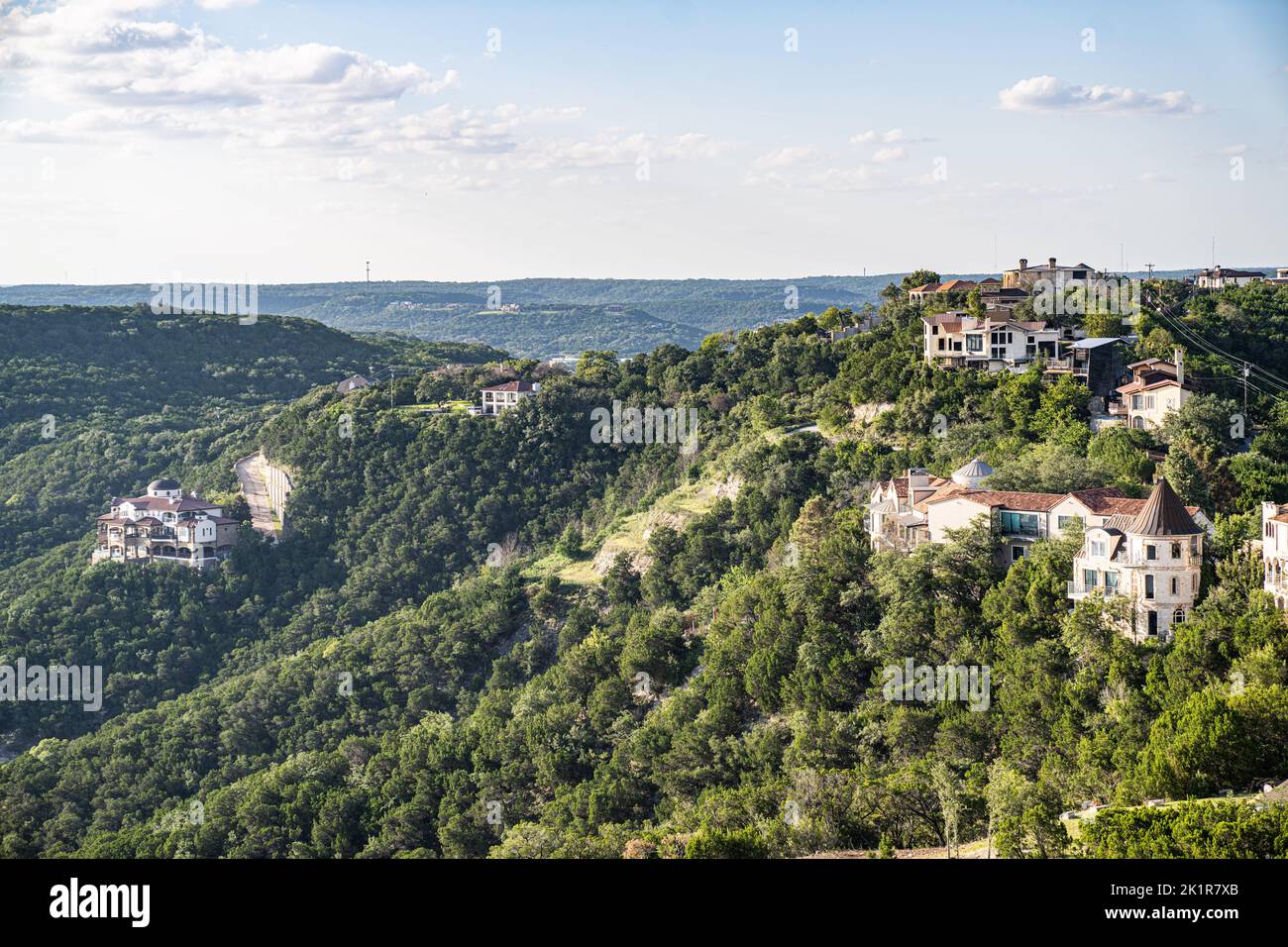 An aerial shot of mansions and hill top homes in Austin West Lake Stock ...