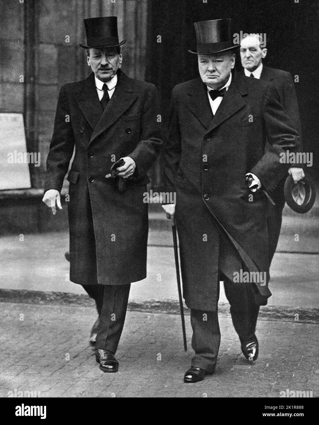 Winston Churchill and Clement Attlee leaving Westminster Abbey at the funeral of Lord Gort.  April 1946 Stock Photo