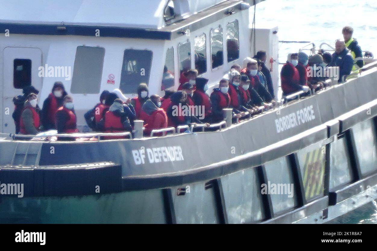 A group of people thought to be migrants are brought in to Dover, Kent, onboard a Border Force vessel following a small boat incident in the Channel. Picture date: Tuesday September 20, 2022. Stock Photo