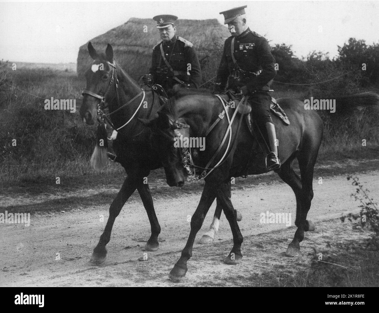 Winston Churchill on horseback with Sir John French during army manoeuvres .. 1910 Stock Photo