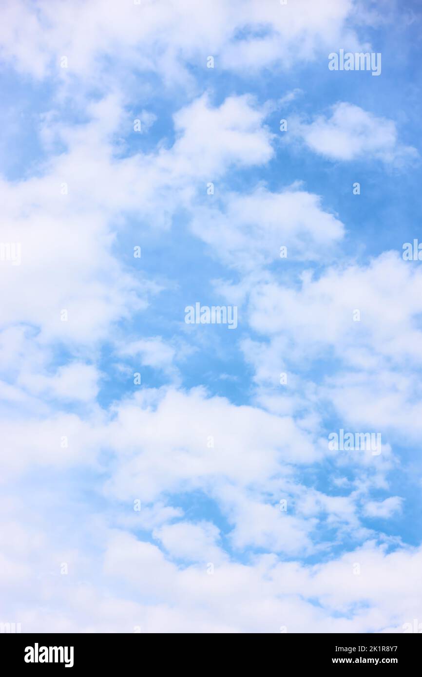 White clouds in the sky - vertical background with copy space Stock Photo