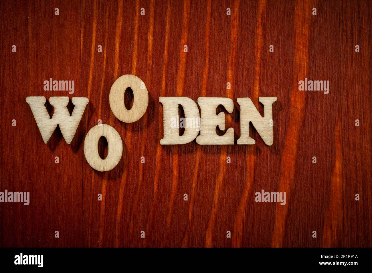 Word 'Wooden' by wood letters close up Stock Photo