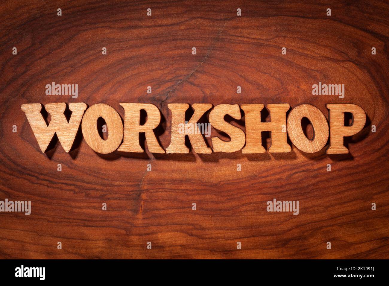Workshop word - Inscription by wooden letters close up Stock Photo