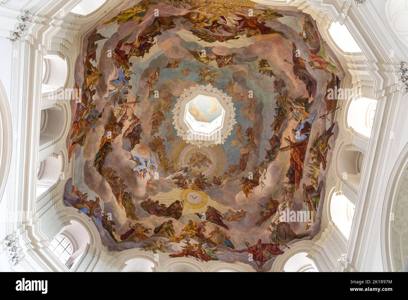 Beautiful close-up view of the large dome fresco in the cupola of the western octagon of the famous Neumünster Collegiate church in Würzburg, Germany. Stock Photo