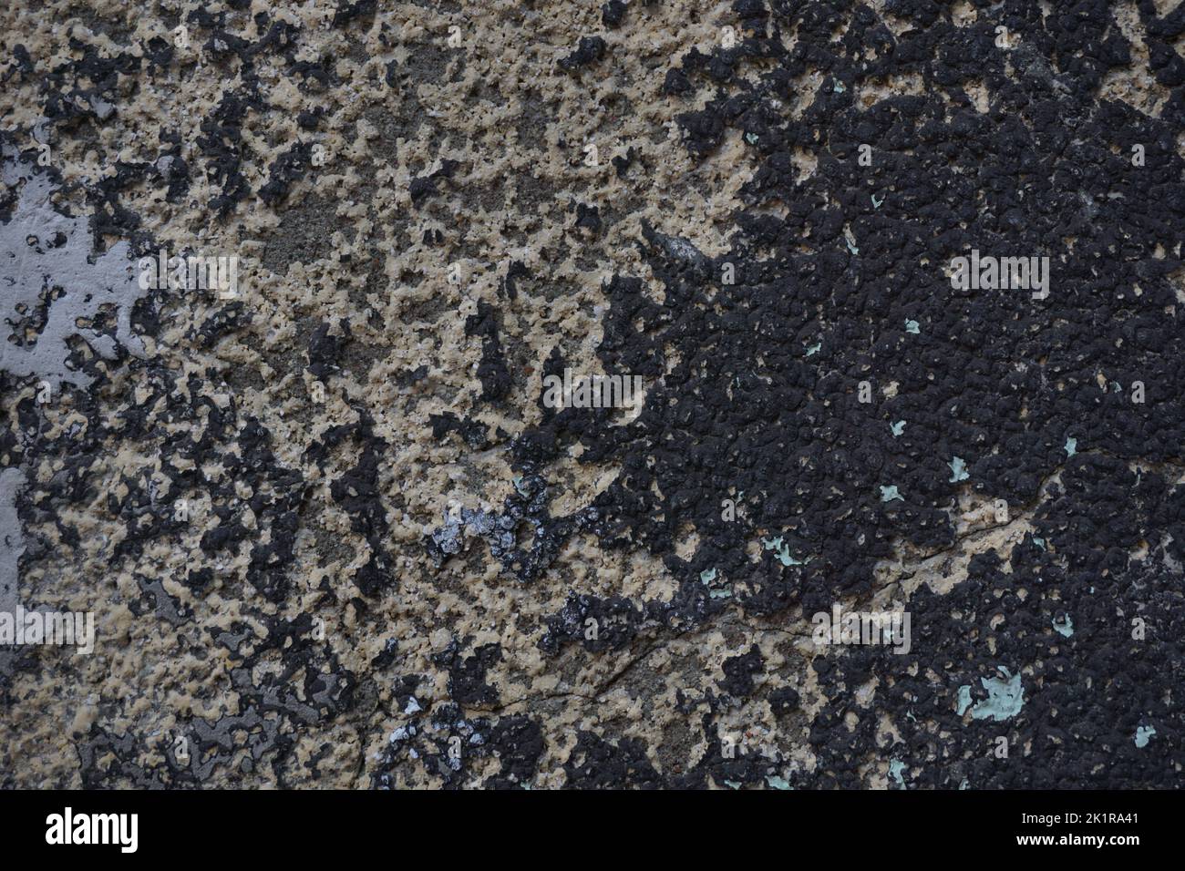 Cracked wall with old layers of paint, copy space Stock Photo