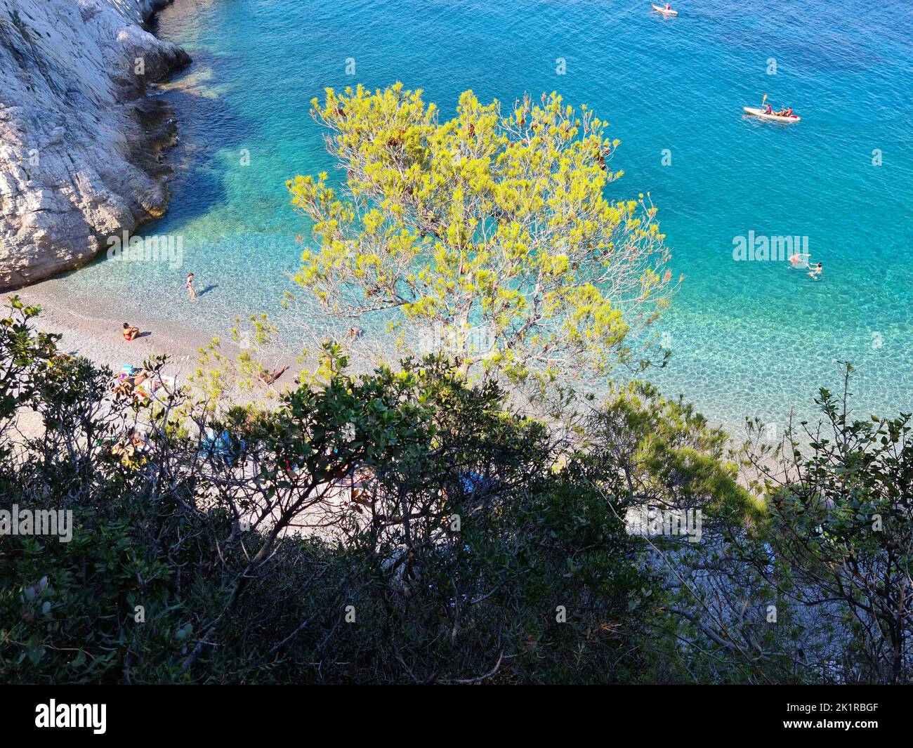 Spotorno beach near Bergeggi with its picturesque beaches and the colors of the Mediterranean sea. Stock Photo