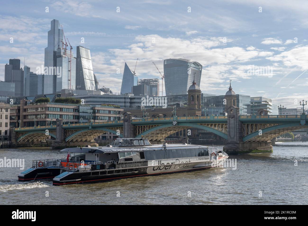 City of London, 20 September 2022. An Uber Boat travels downstream past City of London skyscrapers on London’s first day back to work after the funeral of Queen Elizabeth II. Credit: Malcolm Park/Alamy Live News Stock Photo