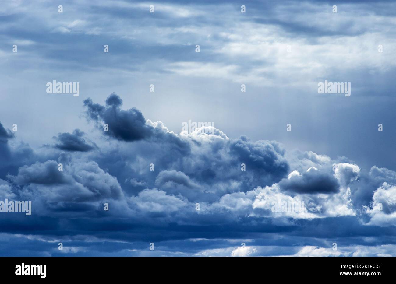 Image natural phenomenon dark clouds on gray sky Stock Photo