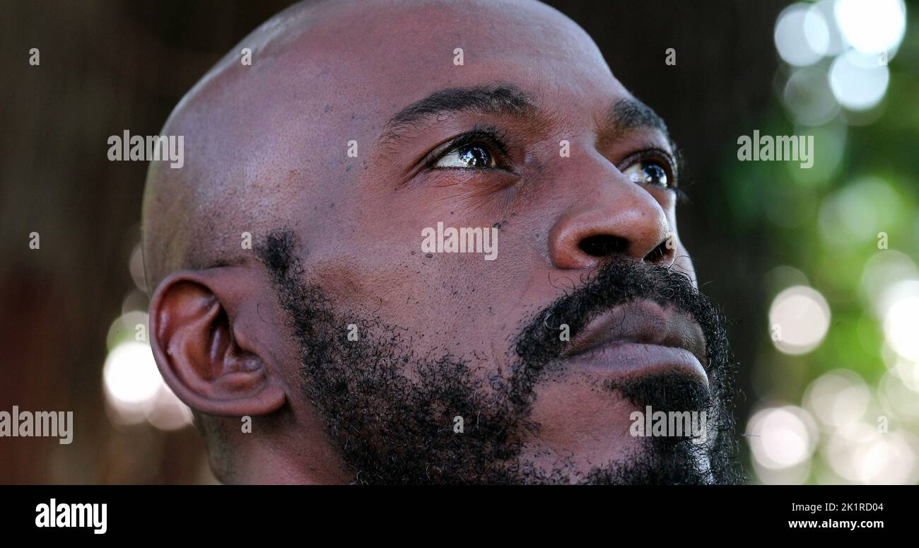 Faith african man looking sky hi-res stock photography and images - Alamy
