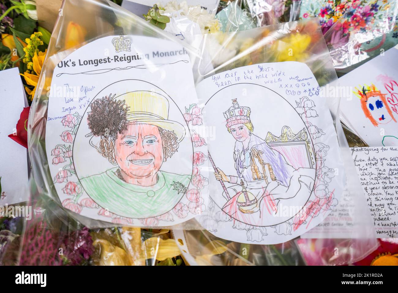 London UK. 20 September 2022. Drawings  left by children  in Green Park as tribute to Queen Elizabeth II.  On Monday 19 September the Queen's coffin was  carried on a gun carriage from Westminster Hall followed by King Charles III and Camilla, Queen Consort after lying in state for four days. which took place will followed by a private interment at St Georges's Chapel in Windsor .Credit: amer ghazzal/Alamy Live News. Stock Photo