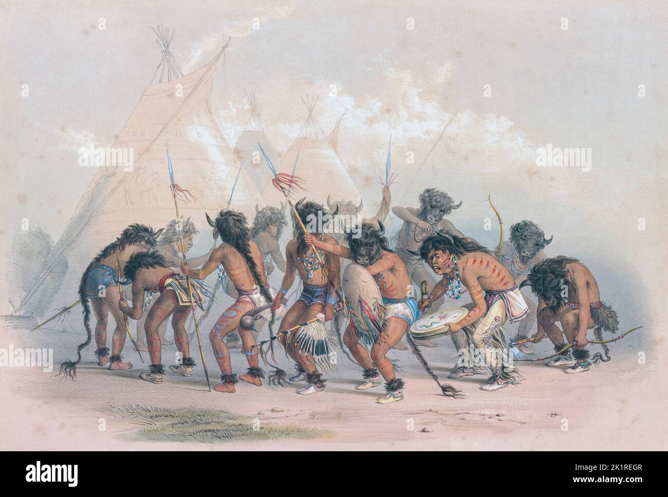 Buffalo Dance.  Or Bison Dance.  Many  North American Plains Indians performed this ceremony which normally coincided with the annual return of the buffalo herds upon which the Indians were dependent for food and resources.  From Catlin's North American Indian Portfolio, published in London 1844 by the artist, American adventurer George Catlin, 1796 - 1872.  During many journeys Catlin recorded with pen and brush the customs and life-styles of Native American tribes. Stock Photo