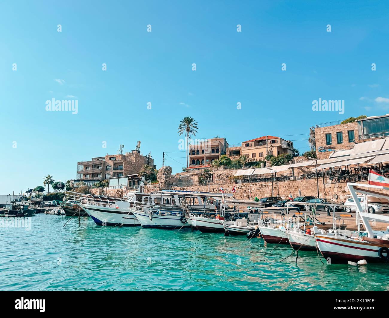View of Famous and Historic Mediterranean Coastal Town: Byblos, Lebanon - Tourist attractions of Byblos with restaurants and boats in Lebanon - view f Stock Photo