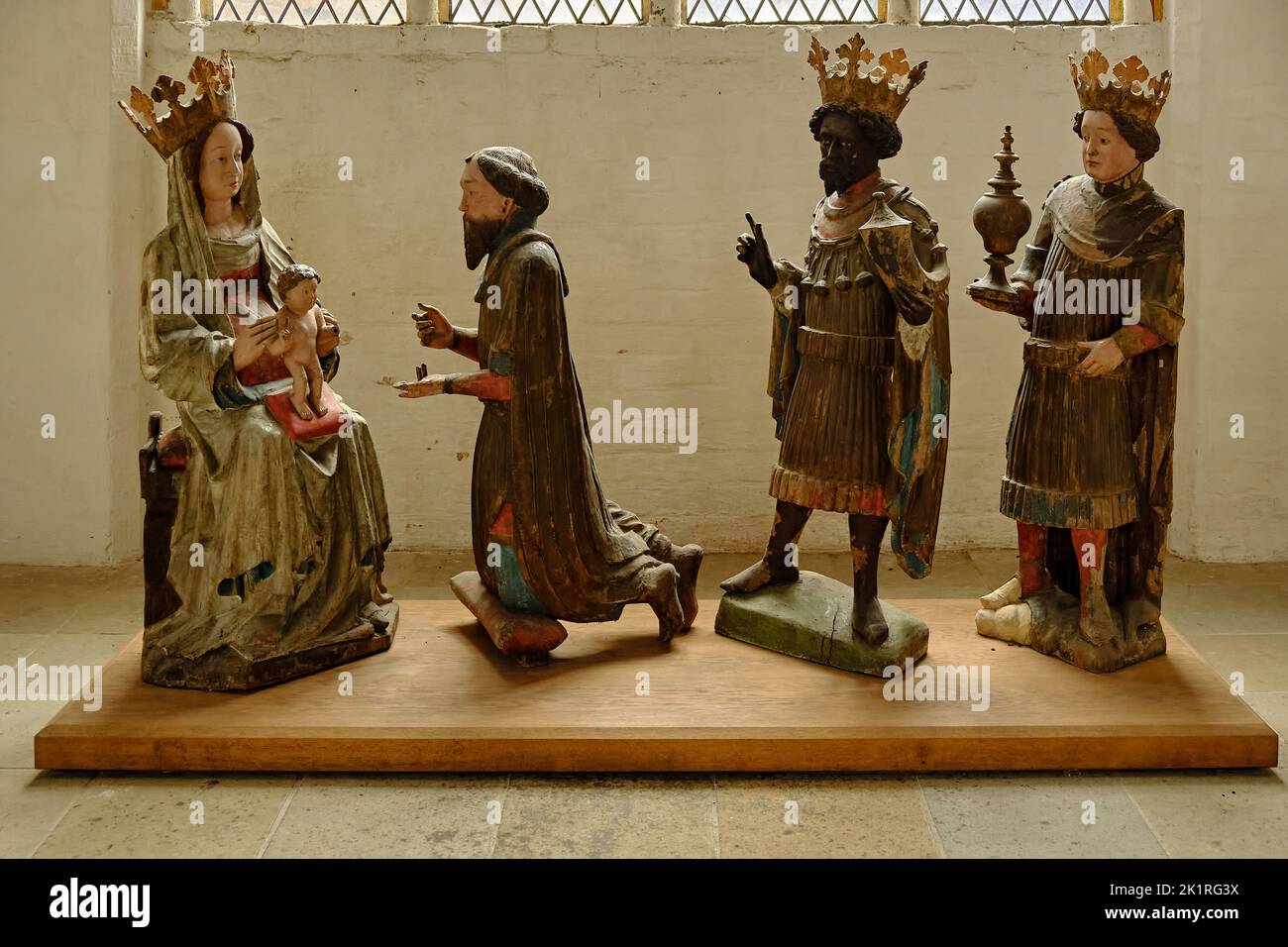 Adoration of the Magi, 15th century Epiphany group in the Church of the Holy Spirit in the Old Town of the Hanseatic Town of Wismar, Germany. Stock Photo