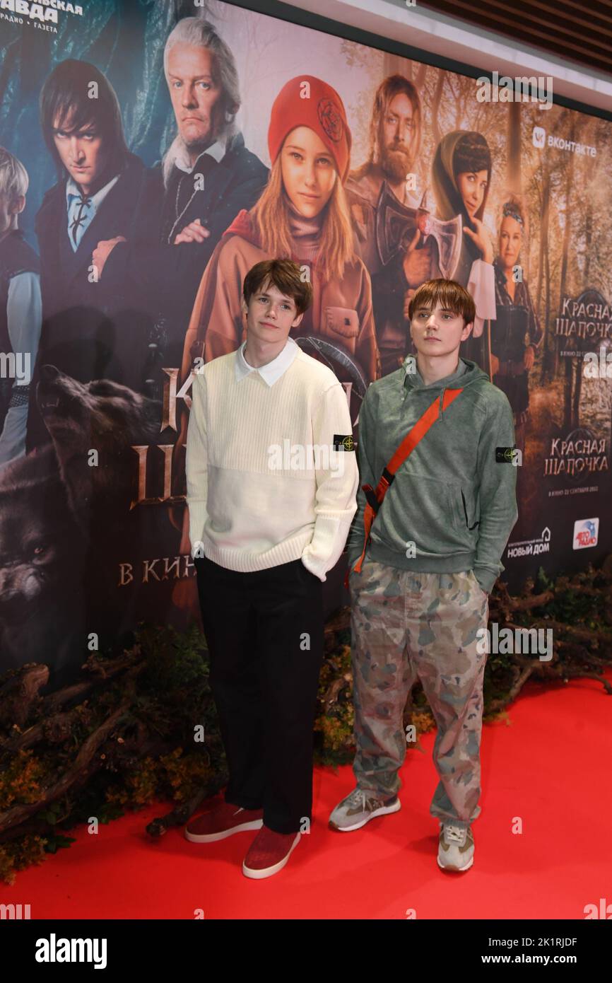 Moscow. Actors Oleg Chugunov and Egor Gubarev (from left to right) on a premiere of the film Little Red Riding Hood at Caro movie theater. Stock Photo