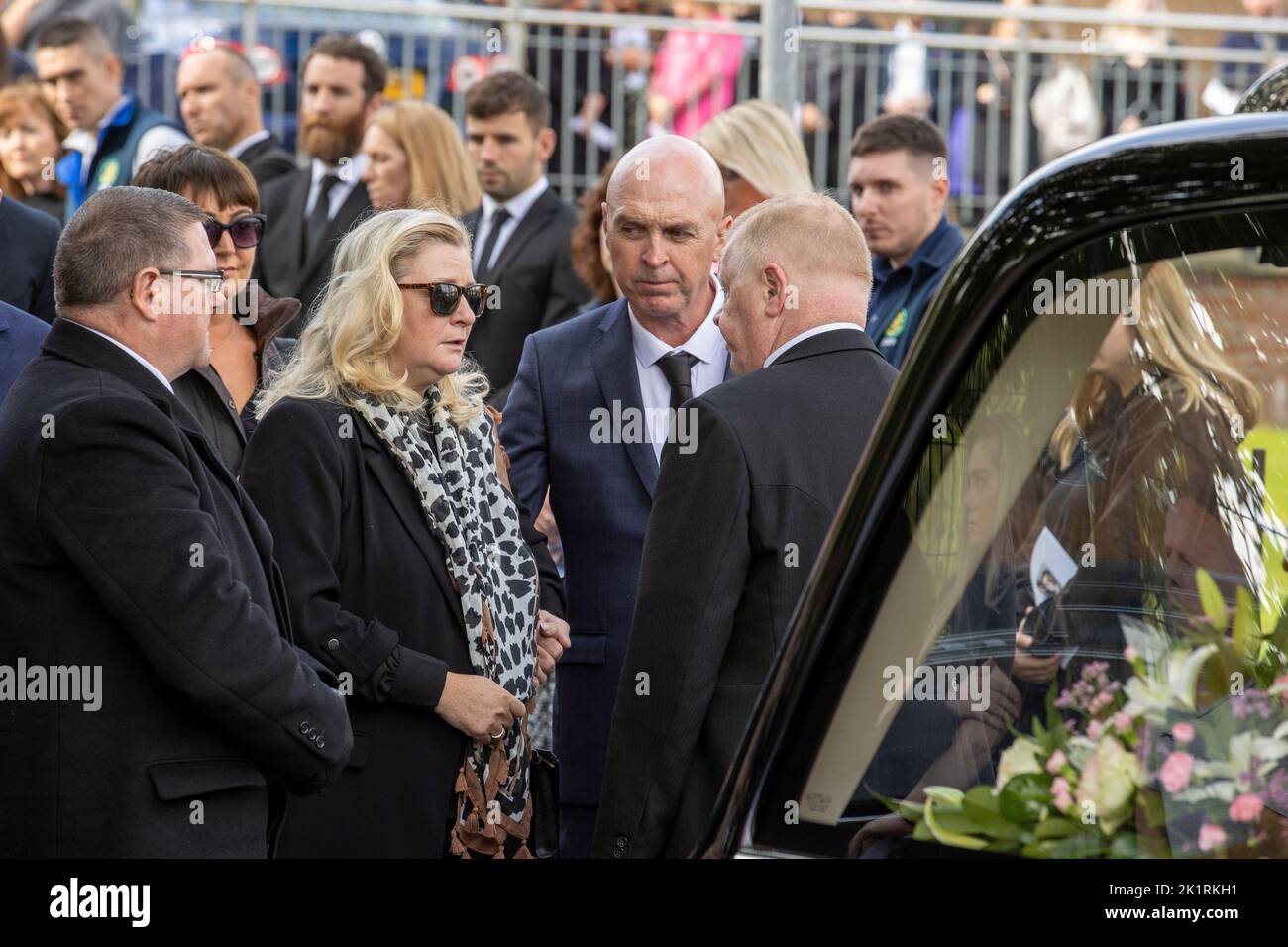 Hollie Thomson’s mother speaking with undertakers after her daughters funeral mass at St Michael’s Church, west Belfast. Picture date: Tuesday September 20, 2022. Stock Photo