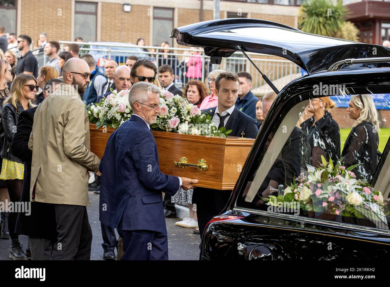 The coffin of Hollie Thomson is placed into the hearse after her funeral mass at St Michael's Church, west Belfast. Picture date: Tuesday September 20, 2022. Stock Photo