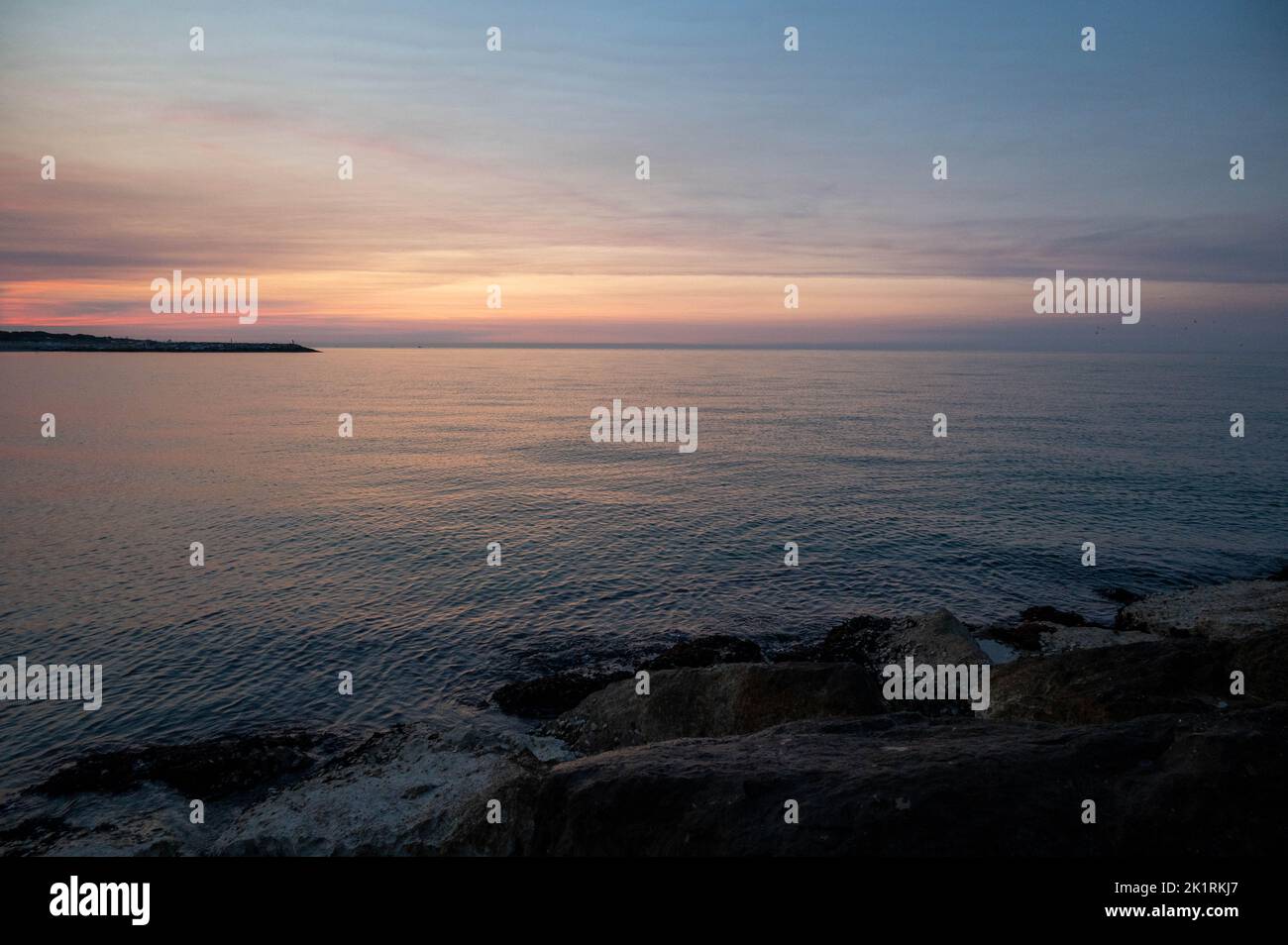 A beautiful landscape of the sea on the sunset Stock Photo - Alamy