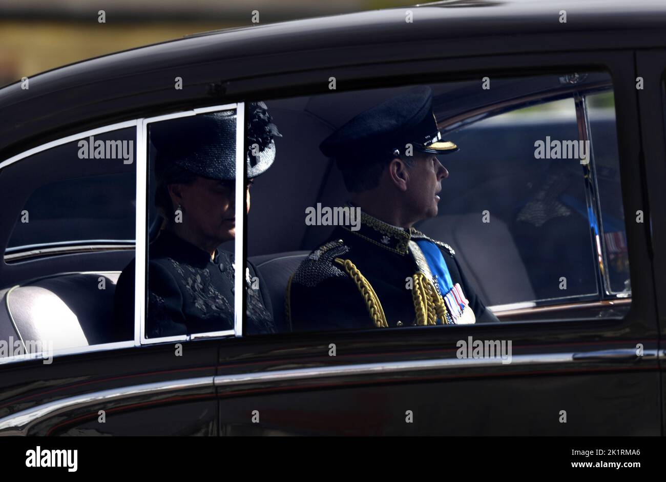 London, UK. The day of the State Funeral of Queen Elizabeth II. The car carrying Prince Edward, Earl of Wessex, and wife Sophie, passes along West Cro Stock Photo