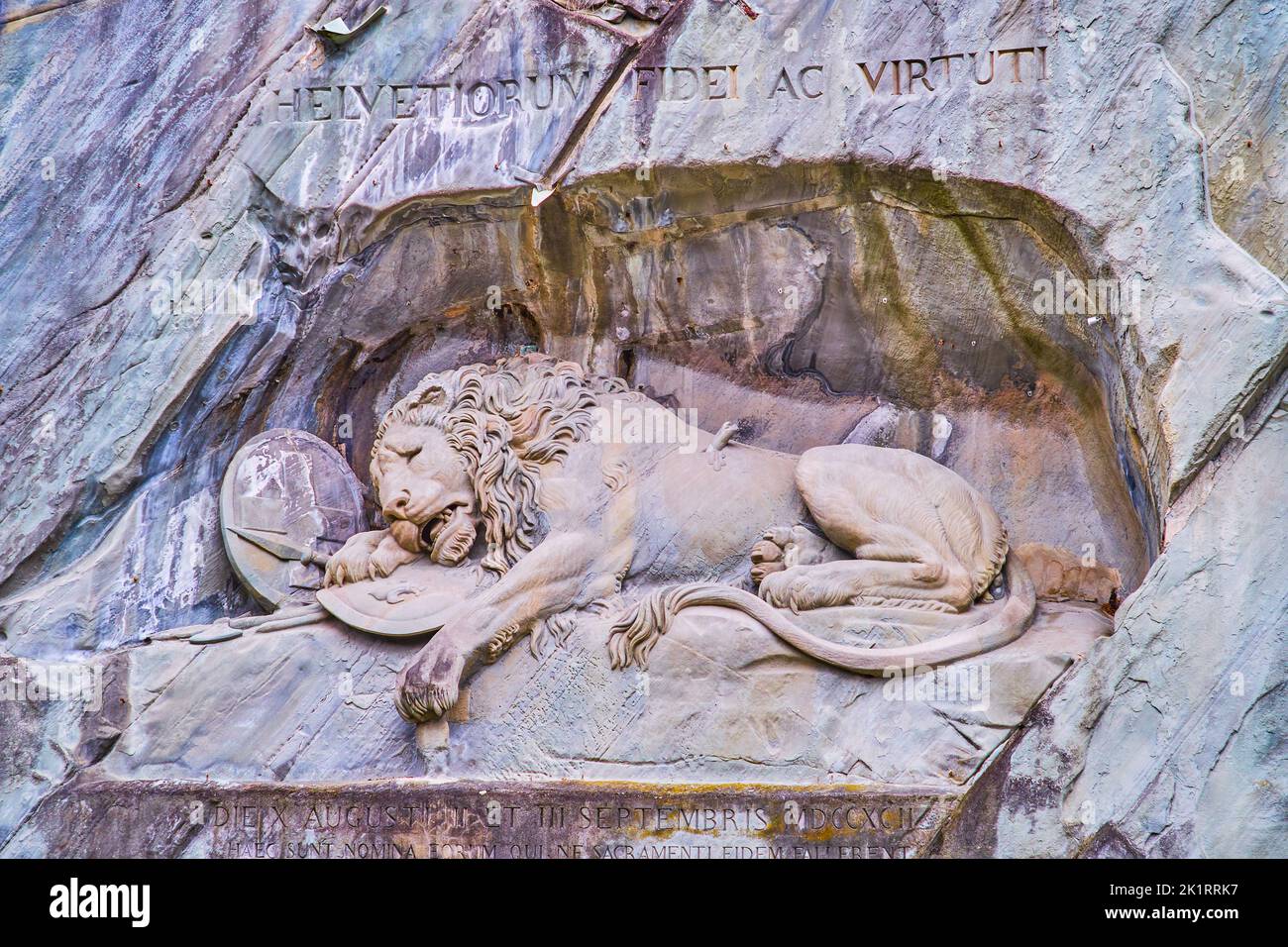 Lion Monument (Lowendenkmal) carved in a rocky cliff is the most famous monument of Switzerland and a visit card of Lucerne city Stock Photo