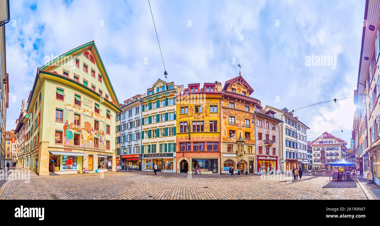 LUCERNE, SWITZERLAND - MARCH 30, 2022: Panoramic view on ornate buildings of Weinmarkt, one of the most beautiful squares in the city, on March 30 in Stock Photo