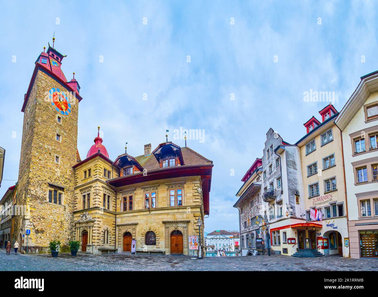 LUCERNE, SWITZERLAND - MARCH 30, 2022: Panoramic view on Kornmarkt square and medieval Town Hall, on March 30 in Lucerne, Switzerland Stock Photo