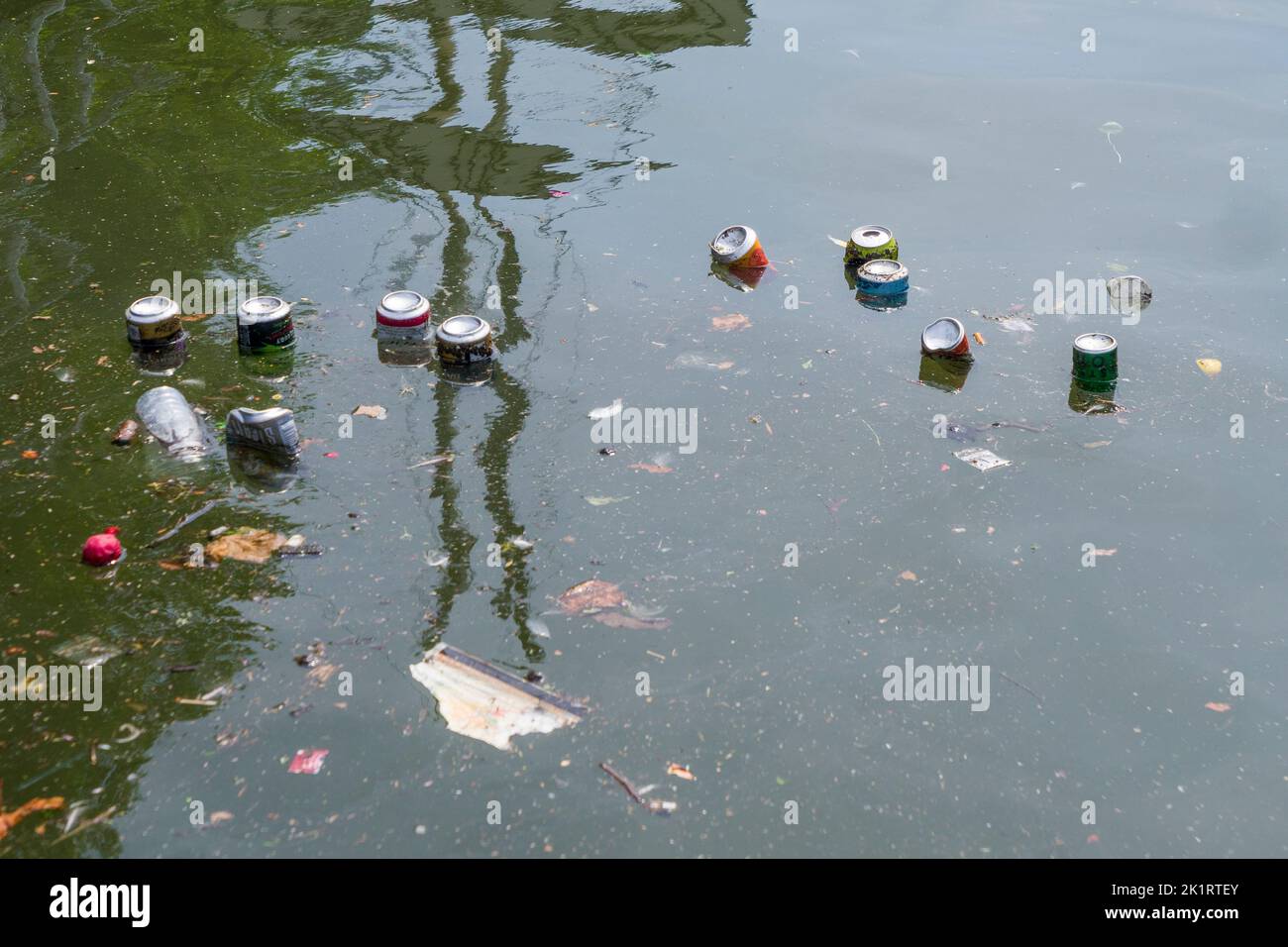 Litter floating in the water at Bristol Harbour in the City of Bristol, England. Stock Photo