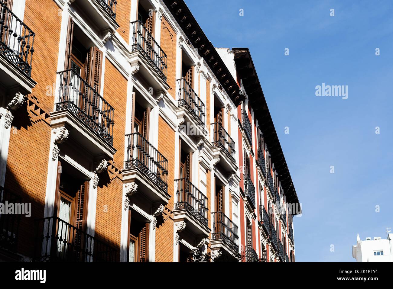 Old luxury residential building in Gran Via Avenue in Madrid Stock Photo