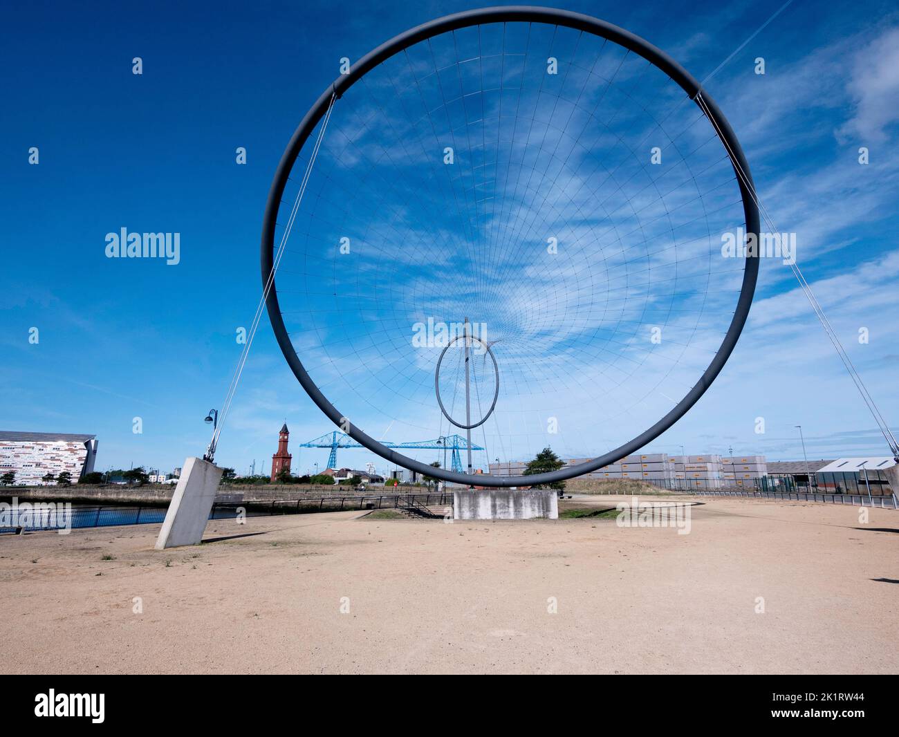 Temenos the  Middlesbrough public art installation by artist Anish Kapoor with the Transporter bridge behind Stock Photo