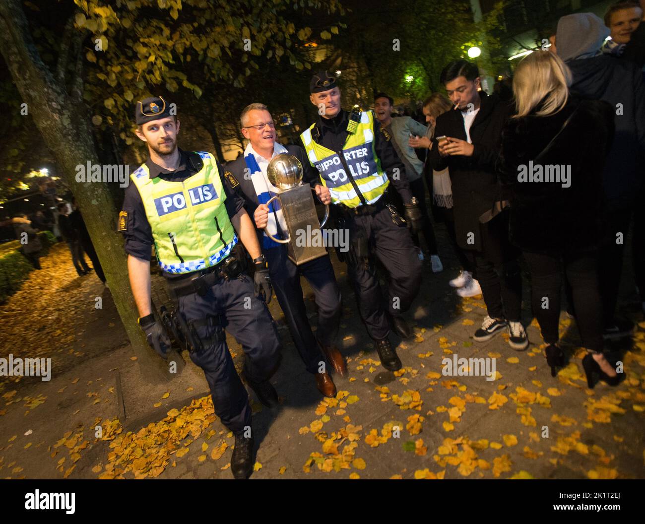 IFK Norrköping's coach Jan 'Janne' Andersson is escorted by police, Norrköping, Sweden, to the banquet after winning and becoming Swedish champions. Stock Photo