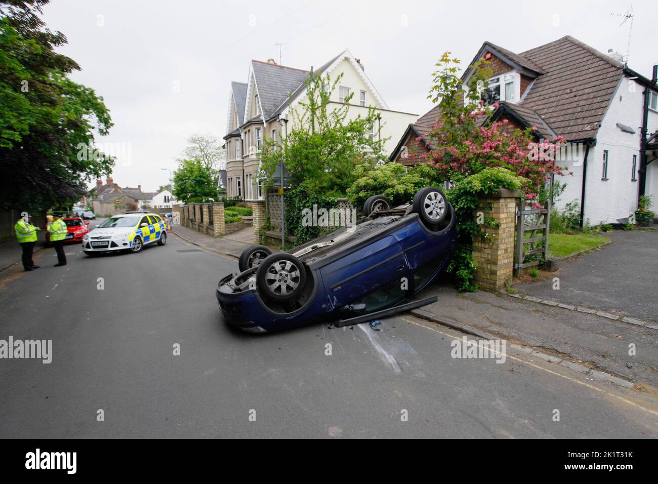 Transport, Road, Cars, Road Traffic Accident, Car overturned in urban street. Stock Photo