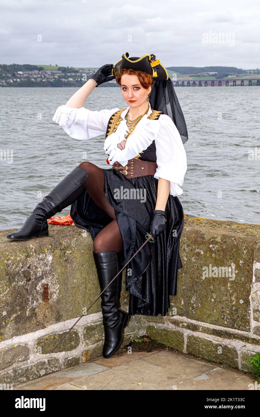 Ashley Wilkinson wearing a cosplay pirate costume along the Dundee Waterfront during a photo-shoot in Scotland Stock Photo