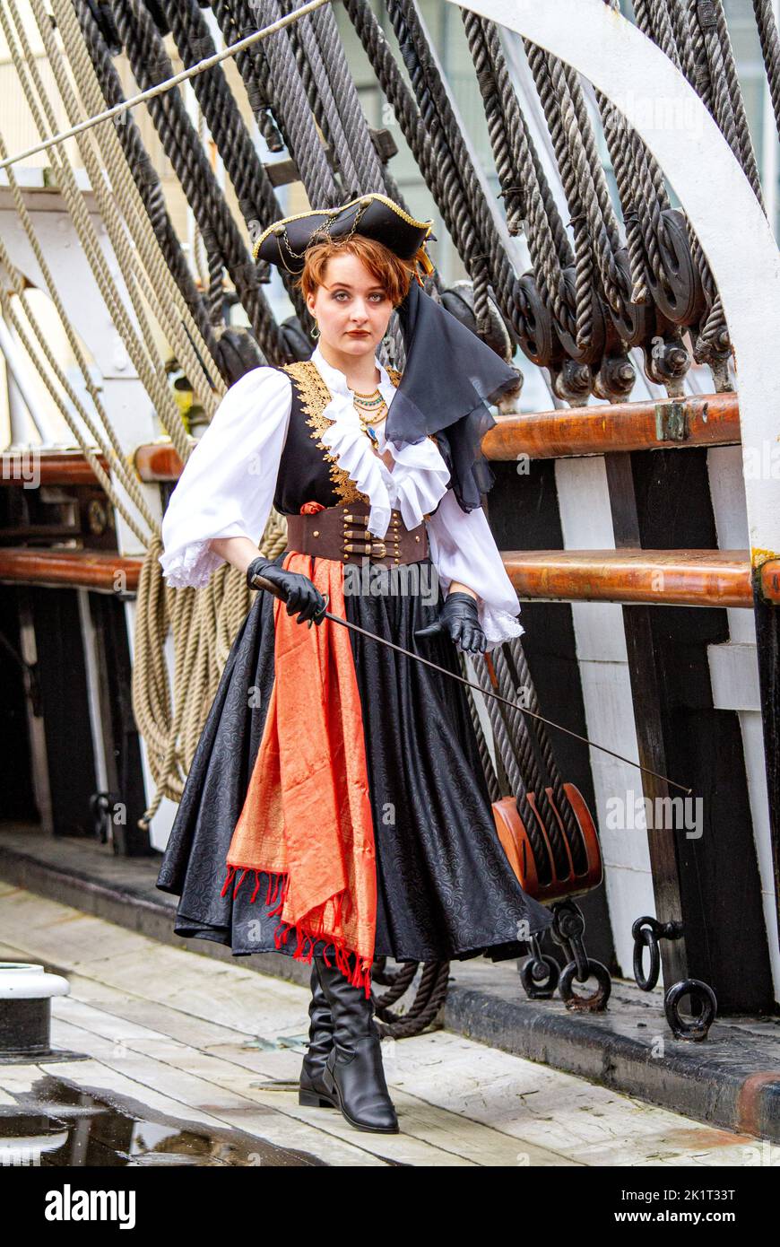 Ashley Wilkinson wearing a cosplay pirate costume onboard the RRS Discovery Ship during a photo-shoot in Dundee, Scotland Stock Photo