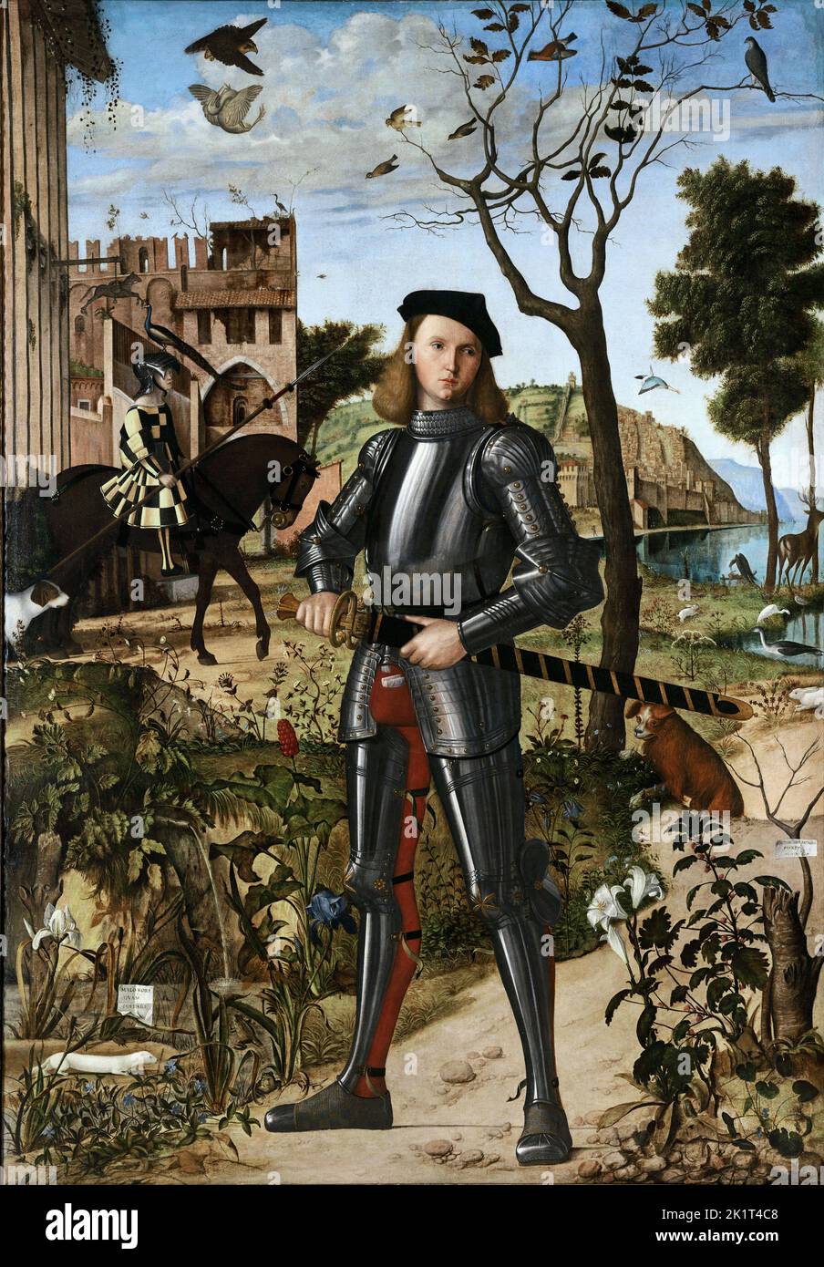Young Knight in a Landscape, Vittore Carpaccio 1510 one of the earliest full-length portraits in European painting Stock Photo