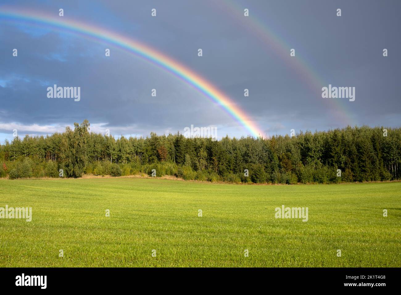 Double rainbow over Latvian landscape in Tukums area, Latvia Stock Photo
