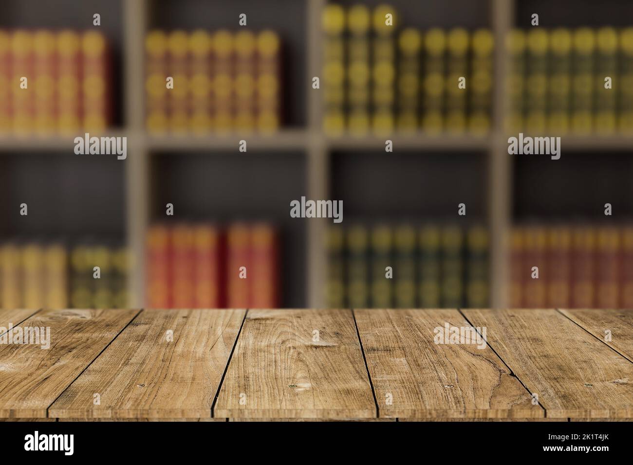 library old books on bookshelf with wooden table space for learning education background Stock Photo